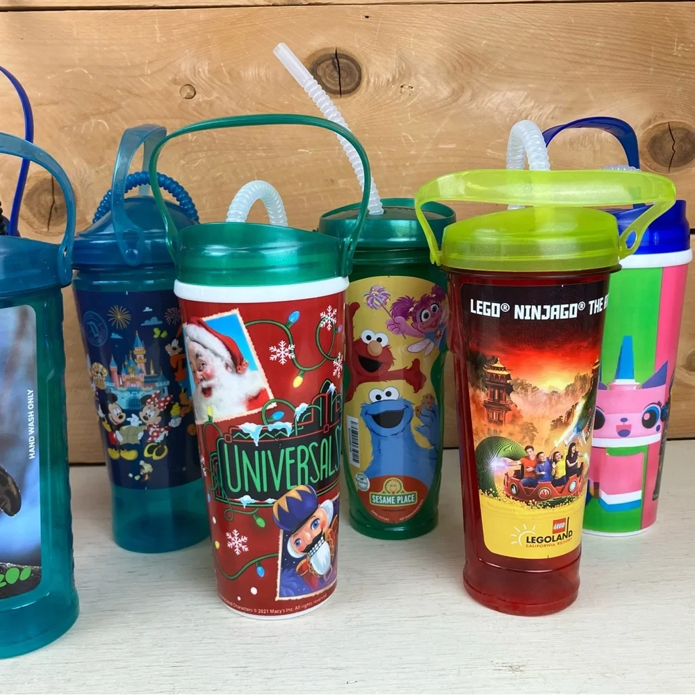 Assorted Lot of 9 Theme Park & Zoo Kids Sipper Cups - Multi-Color Collectable